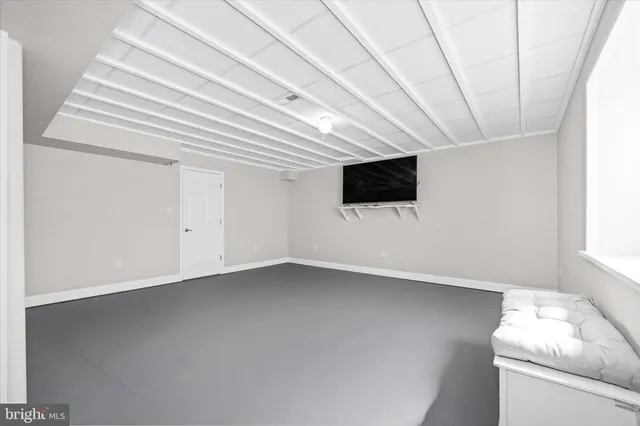 a view of a room with racks on the wall