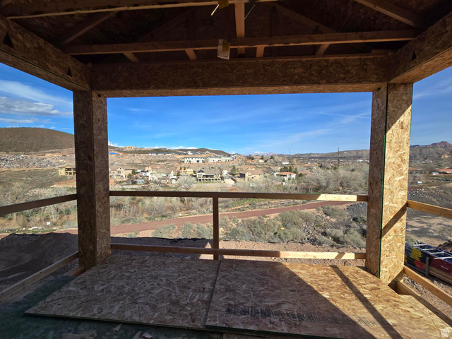 324 North Rhyolite Drive, Unit 87 Hurricane, UT 84737 - Photo 26 of 33 View of yard featuring a mountain view, a balcony, and a residential view