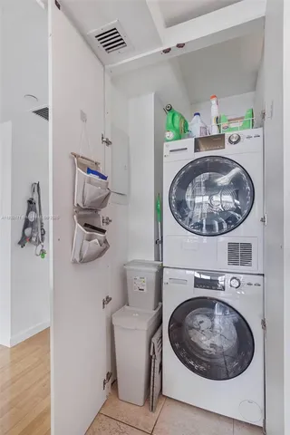 a view of washer and dryer in a utility room