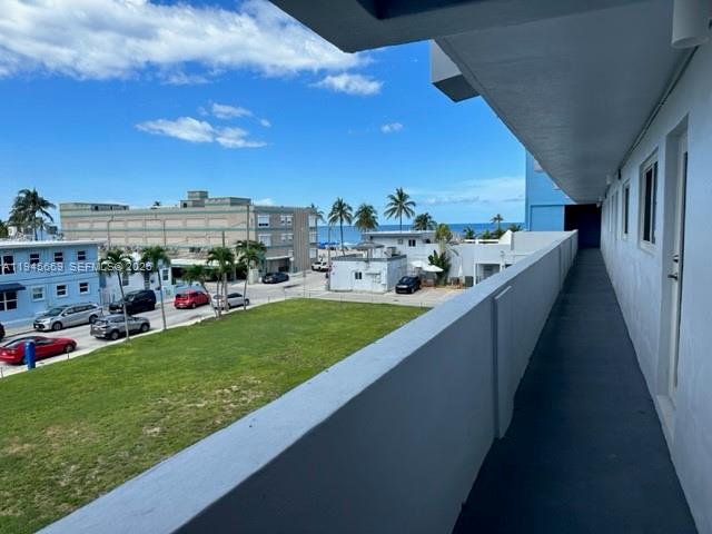 320 South Surf Road, Unit 305 Hollywood, FL 33019 - Photo 17 of 23 a view of a swimming pool from a balcony