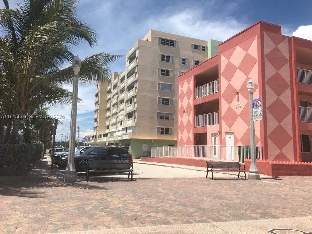320 South Surf Road, Unit 305 Hollywood, FL 33019 - Photo 3 of 23 a view of tall buildings with a terrace
