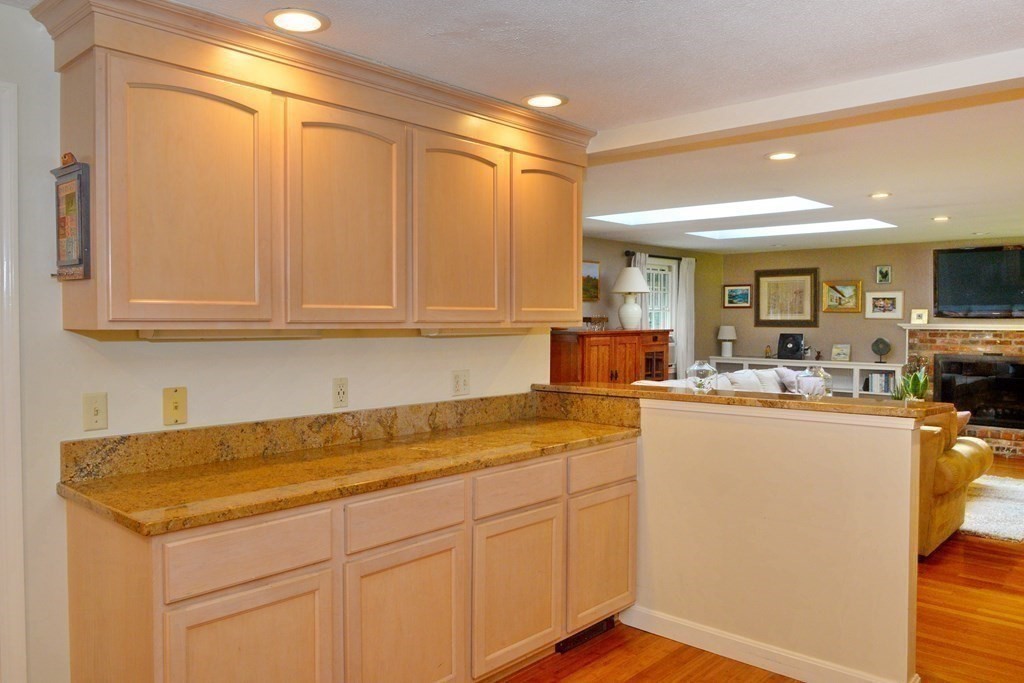 7 Ledgewood Circle Topsfield, MA 01983 - Photo 12 of 36 a kitchen with a sink and cabinets