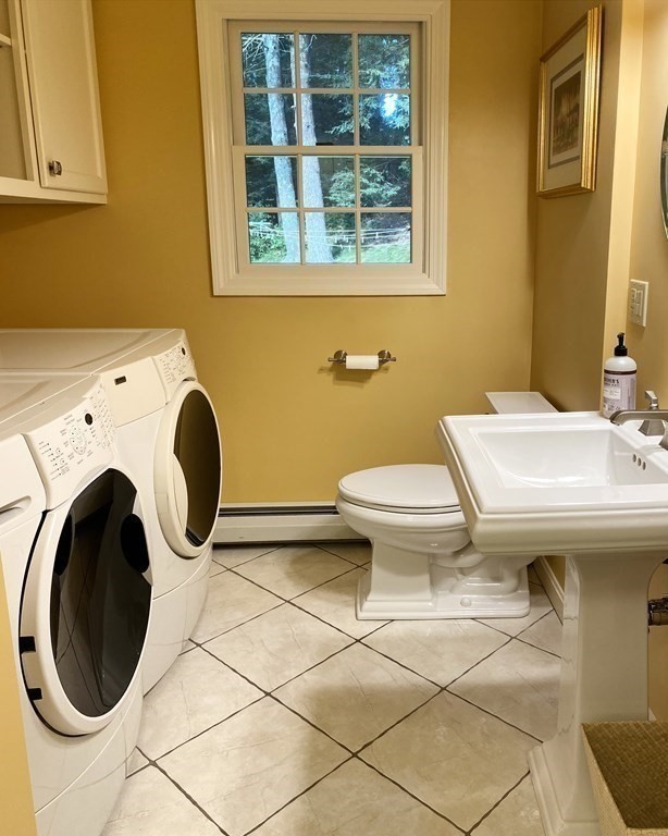 7 Ledgewood Circle Topsfield, MA 01983 - Photo 14 of 36 a bathroom with a sink and a toilet