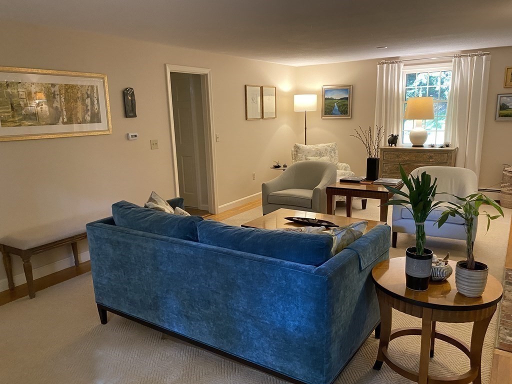 7 Ledgewood Circle Topsfield, MA 01983 - Photo 18 of 36 a living room with furniture and a potted plant
