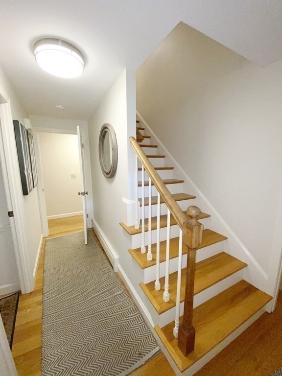 7 Ledgewood Circle Topsfield, MA 01983 - Photo 20 of 36 a view of staircase with wooden floor