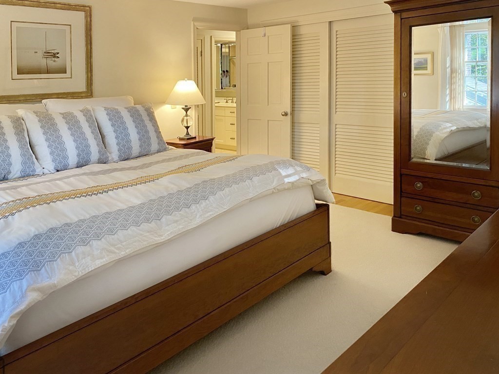 7 Ledgewood Circle Topsfield, MA 01983 - Photo 23 of 36 a bed room with a bed and a night stand