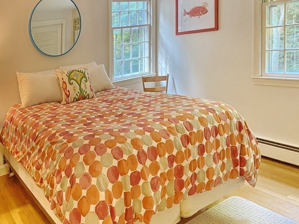 7 Ledgewood Circle Topsfield, MA 01983 - Photo 26 of 36 a bedroom with a bed and a window