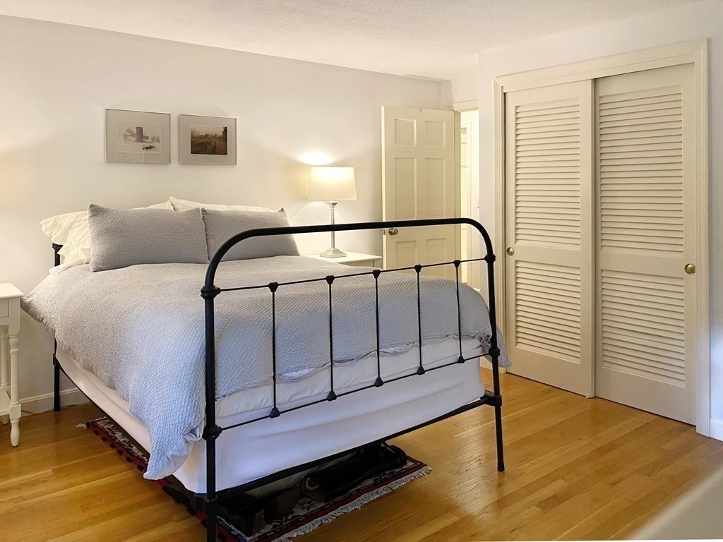 7 Ledgewood Circle Topsfield, MA 01983 - Photo 28 of 36 a bedroom with a bed and a window