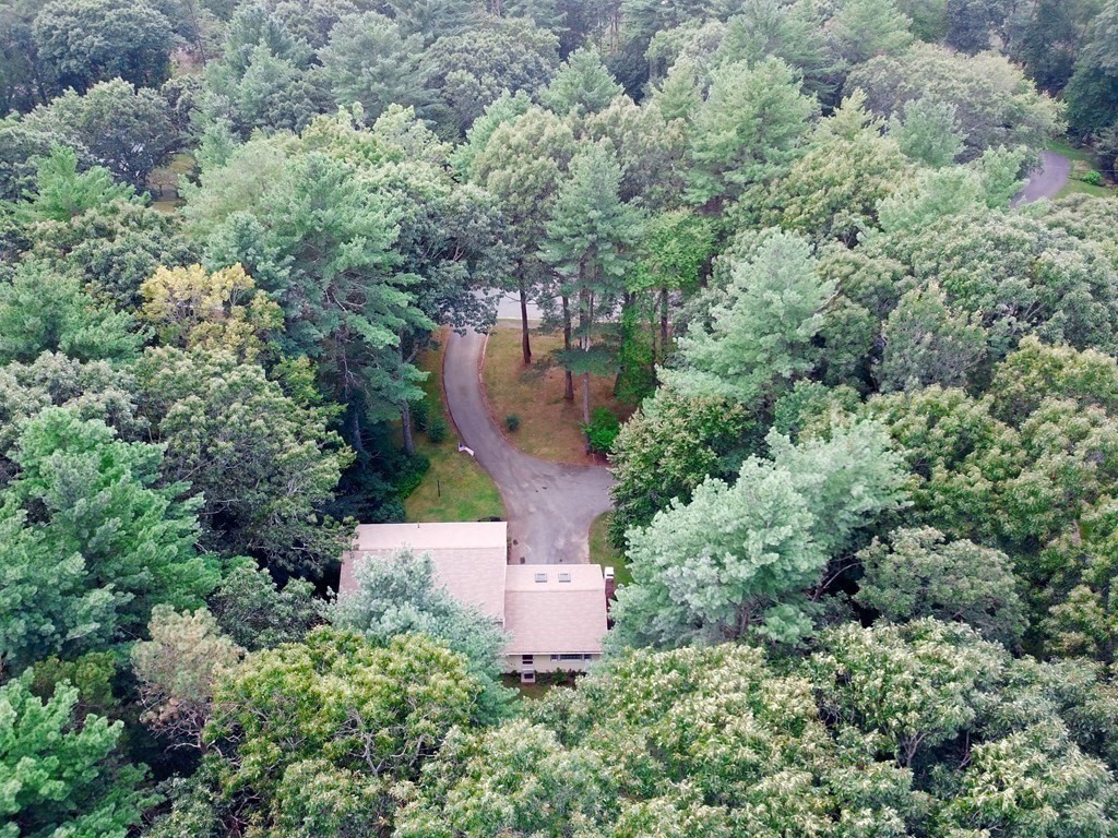 7 Ledgewood Circle Topsfield, MA 01983 - Photo 36 of 36 an aerial view of a house with outdoor space and trees all around