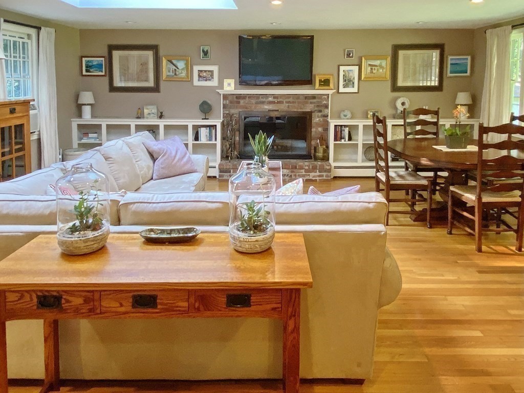 7 Ledgewood Circle Topsfield, MA 01983 - Photo 7 of 36 a living room with fireplace furniture and a flat screen tv