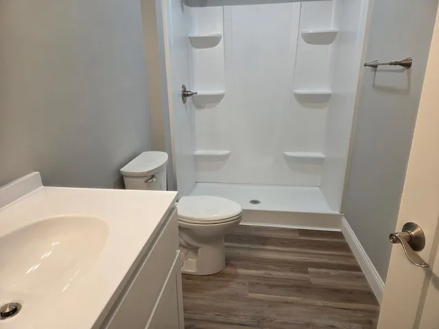 a bathroom with a sink and toilet