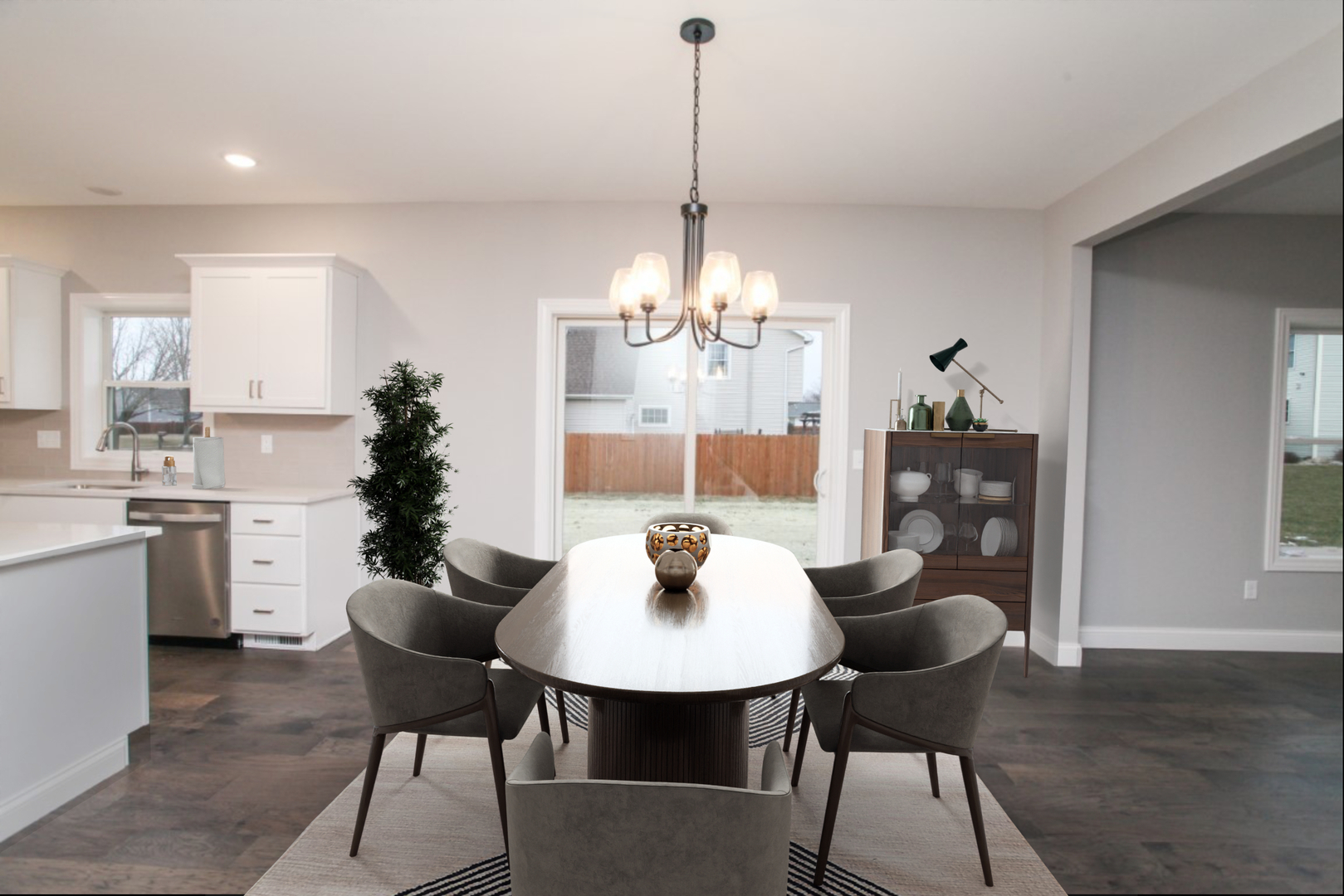 2702 Lone Oak Road Bloomington, IL 61705 - Photo 5 of 19 a dining room with furniture a chandelier and wooden floor