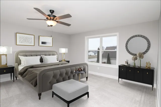 a bed room with a bed and a window