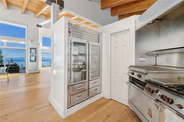 a bathroom with a sink toilet and mirror
