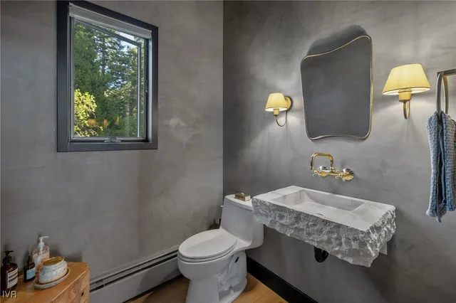 a living room with gym equipment and gym equipment