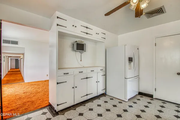 a bathroom with a sink toilet vanity and shower
