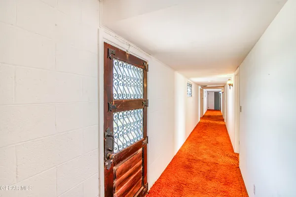 an empty room with a empty space and a ceiling fan view