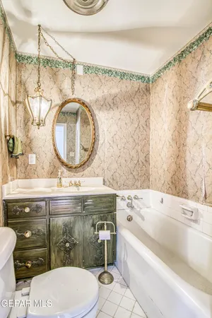 an aerial view of residential building and trees