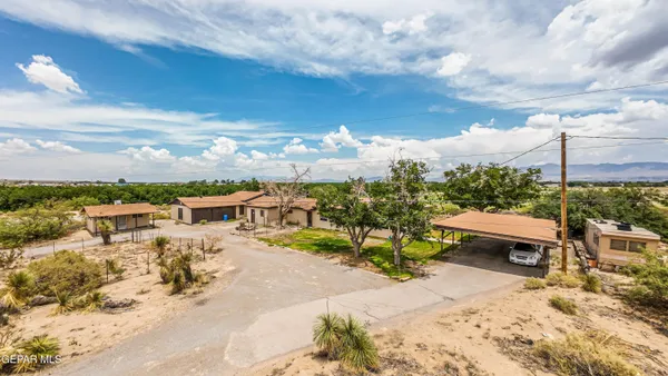 a view of an empty room with a fireplace