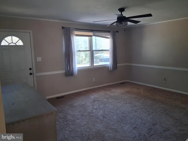 an empty room with a window