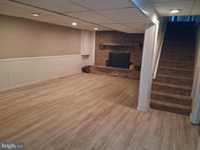 a living room with a fireplace