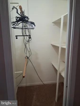 a view of empty room with windows