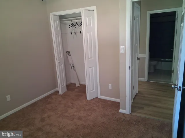 an empty room with closet