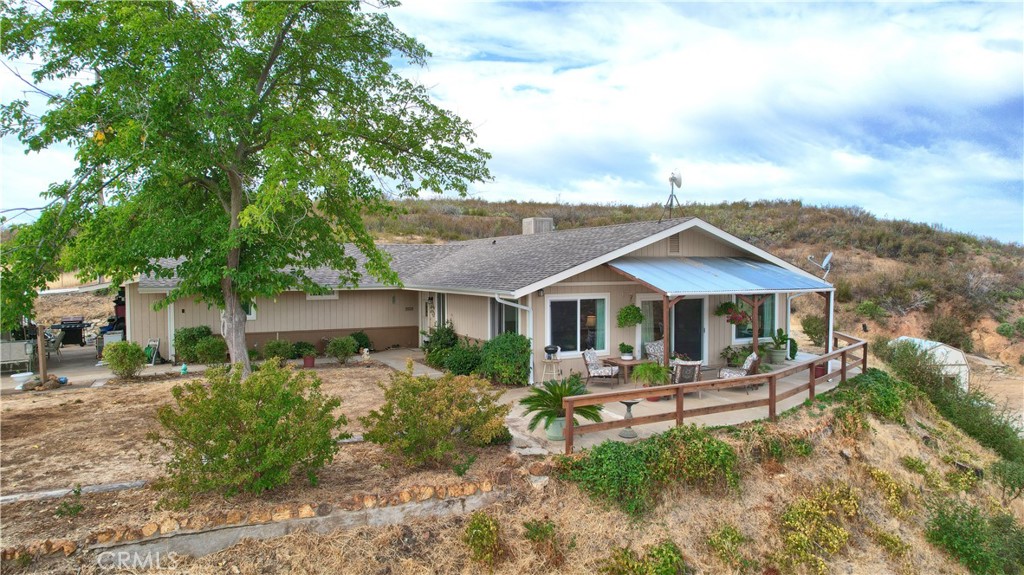 a house view with a garden space