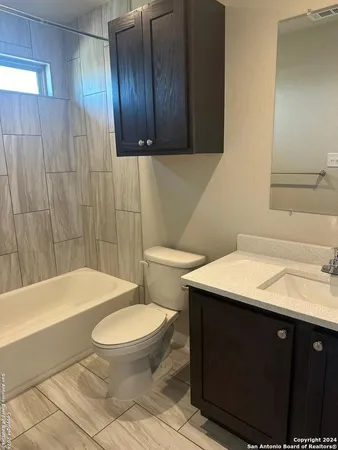 an empty room with closet area