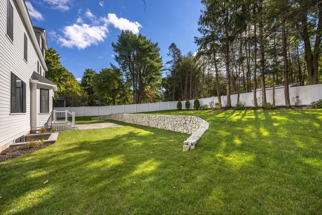 526 Marrett Road Lexington, MA 02421 - Photo 35 of 37 a view of a backyard with swimming pool