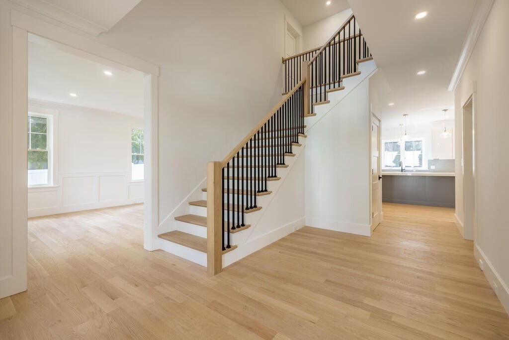 526 Marrett Road Lexington, MA 02421 - Photo 4 of 37 a view of entryway and hall with wooden floor