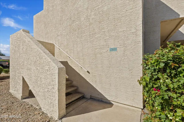 a view of balcony with furniture