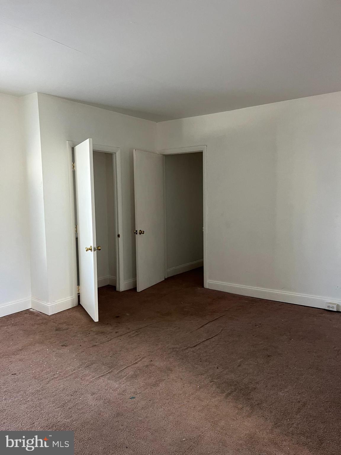 223-225 West High Street Elkton, MD 21921 - Photo 18 of 21 an empty room with closet area