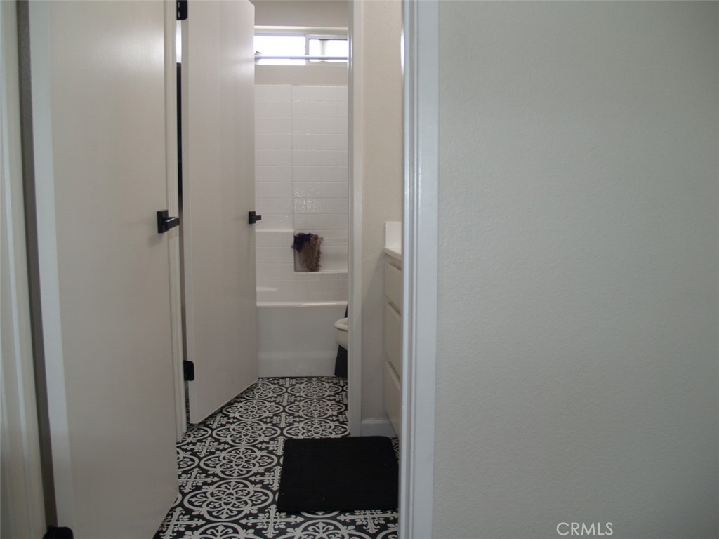 8525 Melosa Way Riverside, CA 92504 - Photo 16 of 27 a bathroom with a sink and a toilet