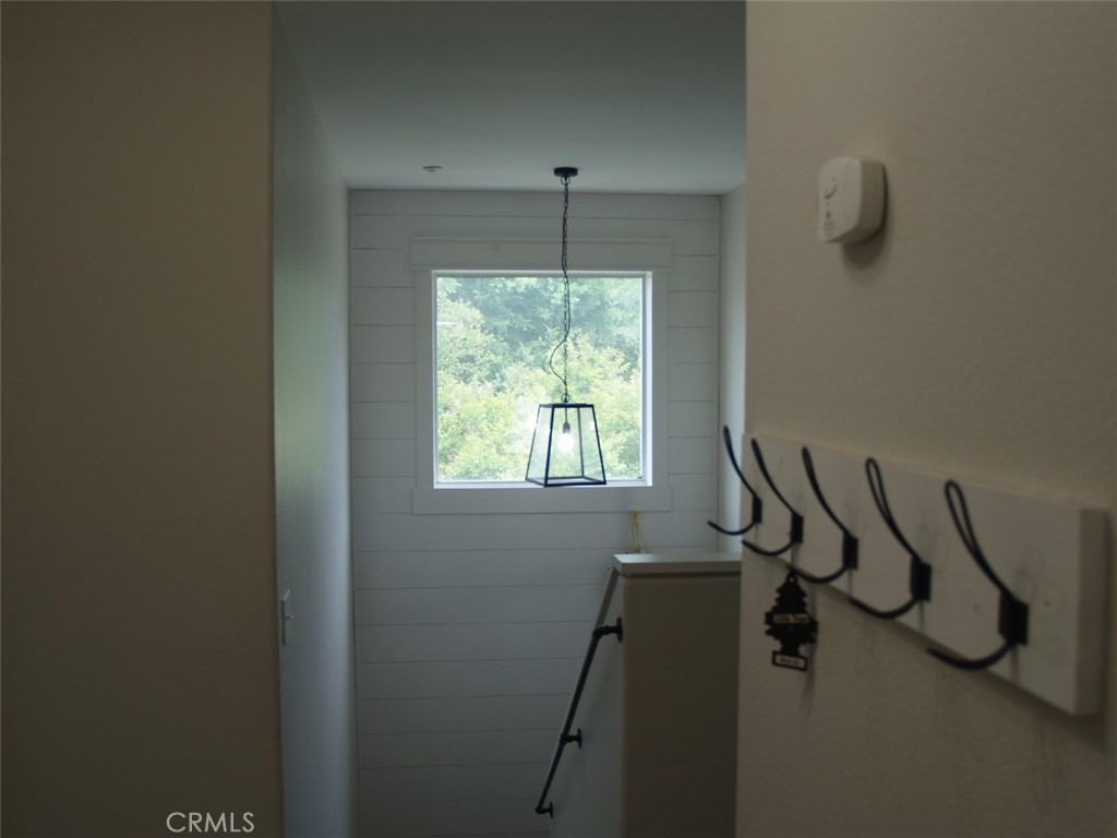 8525 Melosa Way Riverside, CA 92504 - Photo 25 of 27 a bathroom with a shower