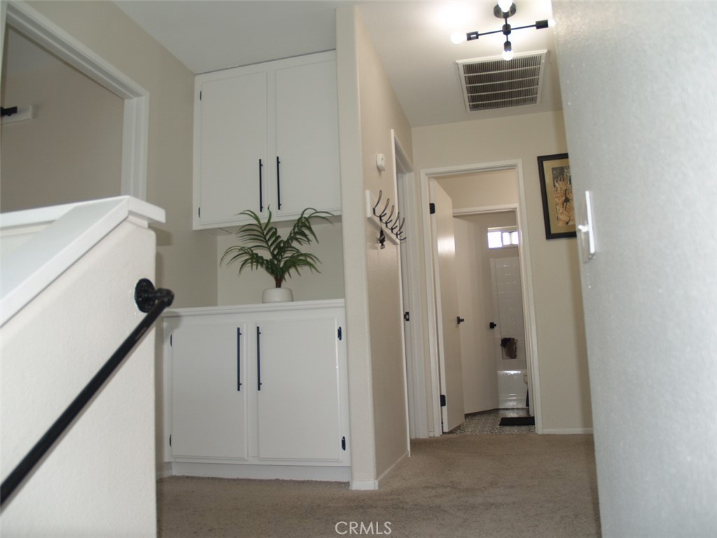 8525 Melosa Way Riverside, CA 92504 - Photo 27 of 27 a view of a hallway with entryway