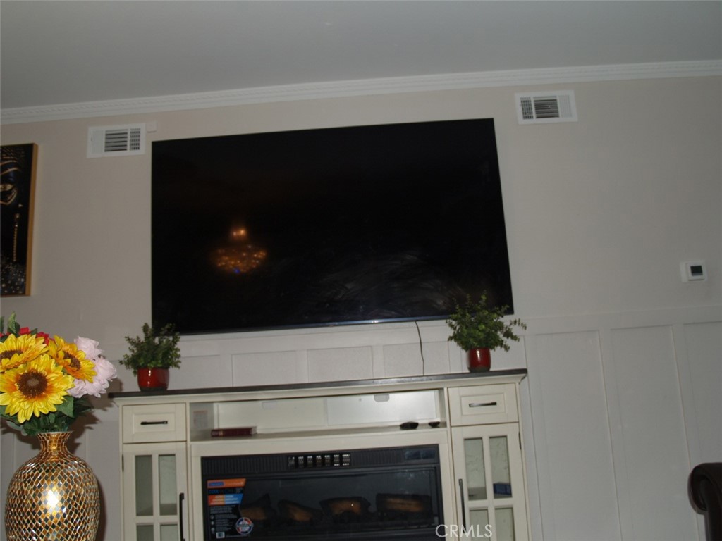 8525 Melosa Way Riverside, CA 92504 - Photo 7 of 27 a stove top oven sitting inside of a kitchen