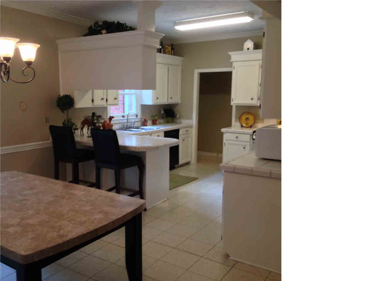 123 Trace Ridge Drive Ridgeland, MS 39157 - Photo 6 of 20 Dine formally or at the kitchen counter.