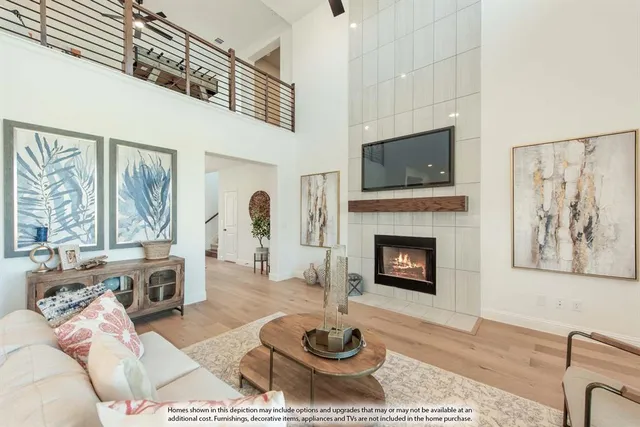 a view of kitchen with stainless steel appliances granite countertop a stove and a refrigerator