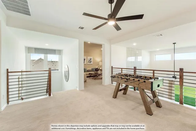 a dining room with a table and chairs