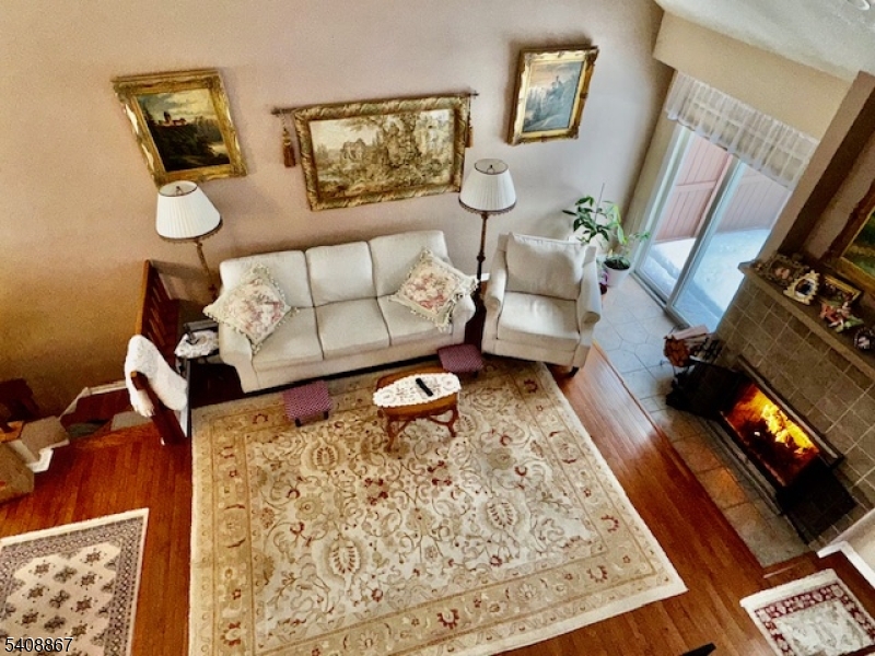 13 Ridgeview Terrace Oak Ridge, NJ 07438 - Photo 2 of 22 a living room with furniture and a rug
