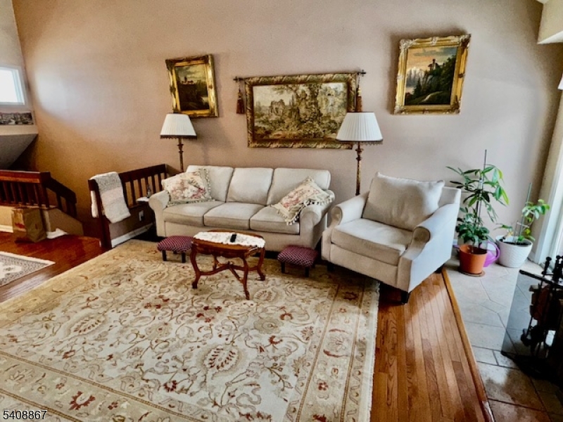 13 Ridgeview Terrace Oak Ridge, NJ 07438 - Photo 4 of 22 a living room with furniture and a couch