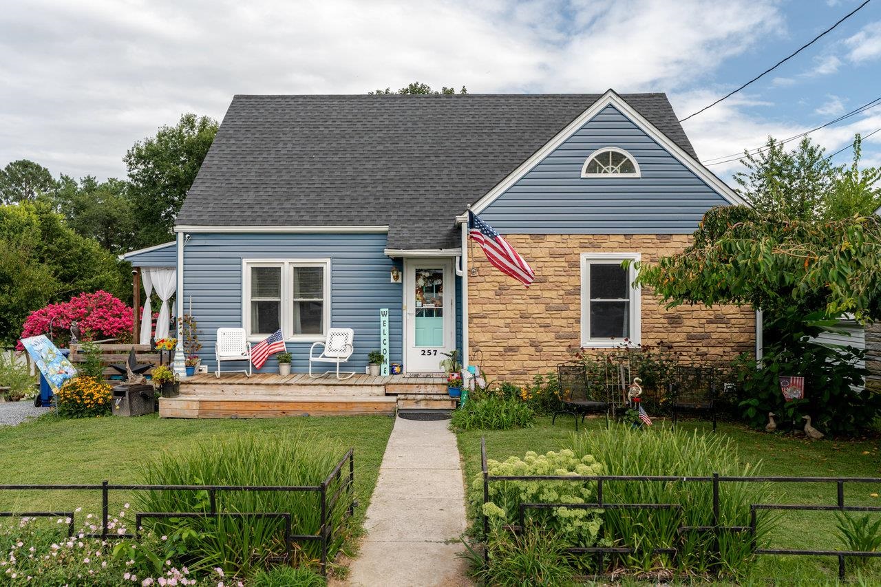 a house view with a garden space