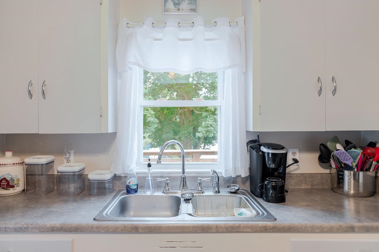 257 Center Street Timberville, VA 22853 - Photo 11 of 73 a kitchen with a sink and a large window