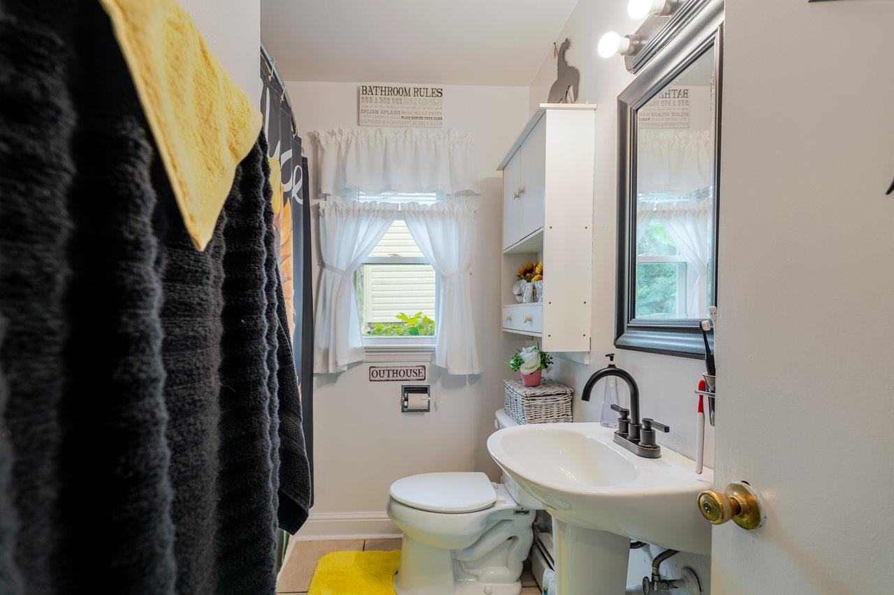 257 Center Street Timberville, VA 22853 - Photo 36 of 73 a bathroom with a sink toilet and shower