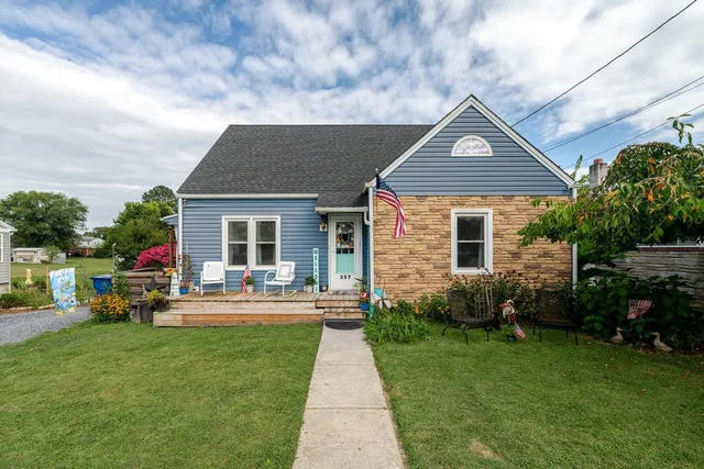 a bedroom with a bed and a television