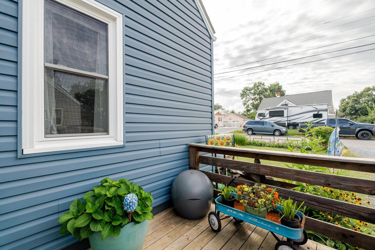 257 Center Street Timberville, VA 22853 - Photo 46 of 73 a wooden bench sitting in front of a building