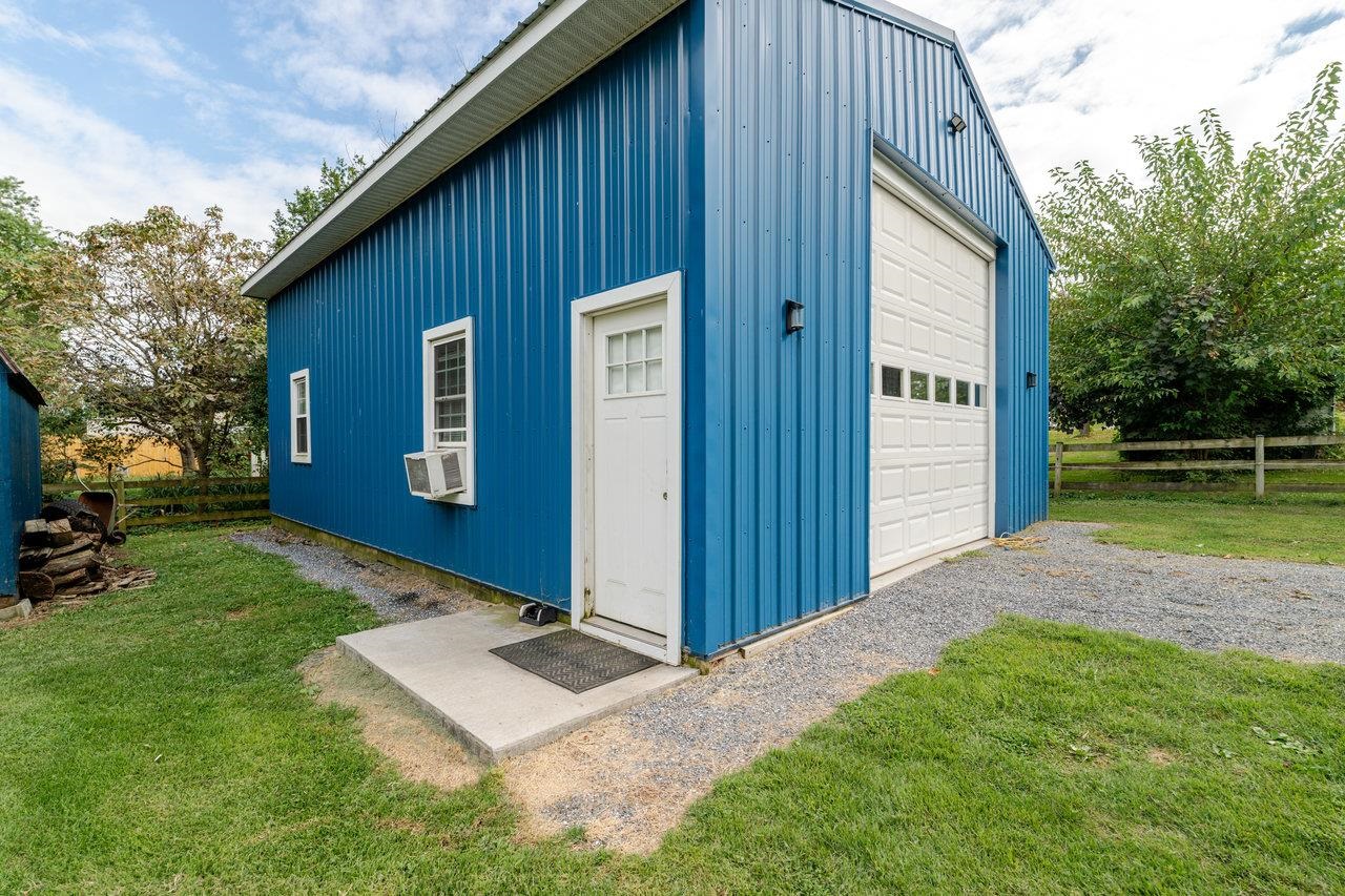 257 Center Street Timberville, VA 22853 - Photo 49 of 73 a front view of house with a garden