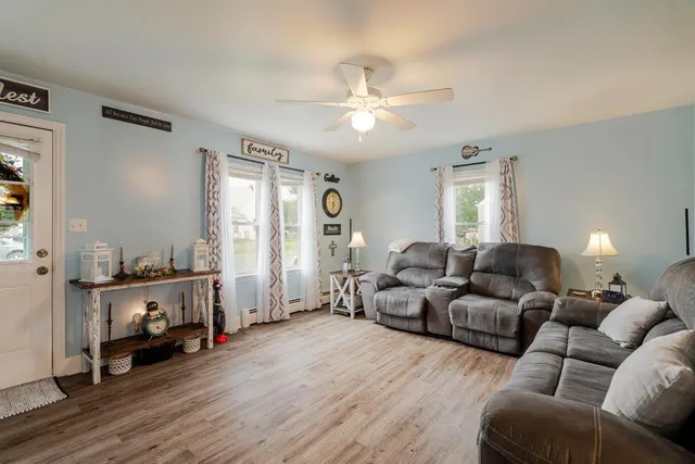 a kitchen with a sink and a large window