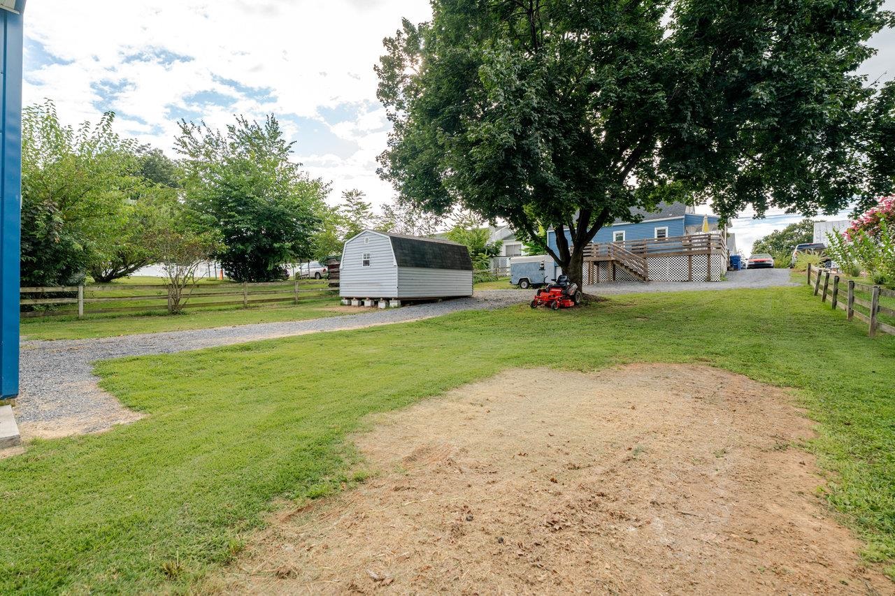 257 Center Street Timberville, VA 22853 - Photo 72 of 73 a view of a house with a big yard and large trees